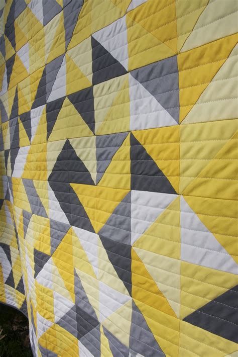 Momotaro Makes Gray Yellow And White Baby Quilt