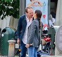 Ralph Fiennes gets cosy with pretty brunette as he takes a break from ...