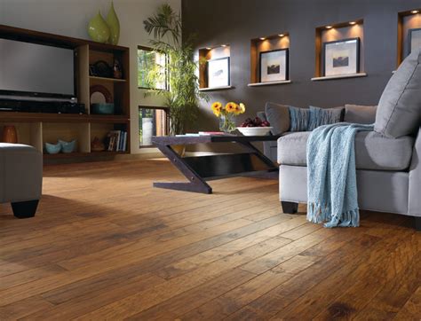 In living rooms, a good sofa is key to comfort, but it's also central to how a room feels and looks. make sure you pay attention to sofa seat height (a low seat is hard to get in and out of) and draw up a furniture floor plan. Hickory Wood Floor Living Room - Contemporary - Living ...