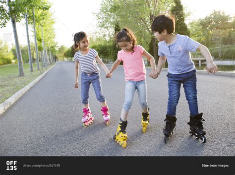 Happy Children Roller Skating Offset Stock Photo Offset