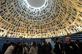 Tourists visit the Hall of Names in the Yad Vashem Holocaust Museum in ...