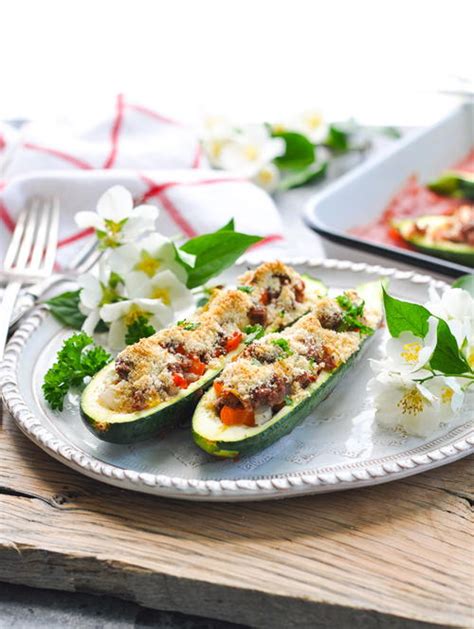 Add onion and cook until softened, then add ground beef and cook until well browned. Easy Stuffed Zucchini Boats | RecipeLion.com