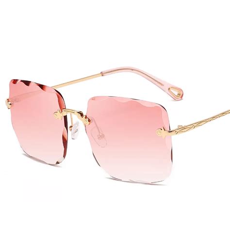 oversized rimless sunglasses women irregular wave lens sun glasses luxury brand metal frame