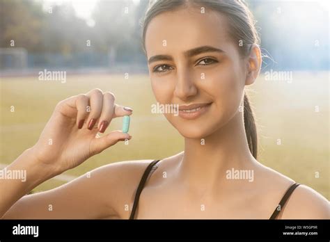 Woman Taking Supplements Happy Hi Res Stock Photography And Images Alamy