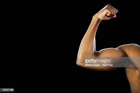 Black Man Flexing Photos And Premium High Res Pictures Getty Images