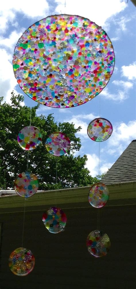 Sun Catcher Made By Melting Plastic Beads Diy Wind Chimes Pony Bead