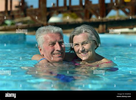 Couple Relaxing In Pool Stock Photo Alamy