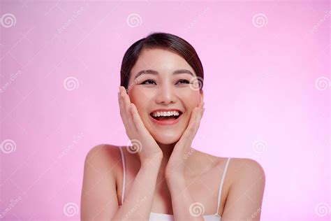 Cute Girl With Big Eyes Looking At Camera And Holding Hands Near Face Stock Image Image Of