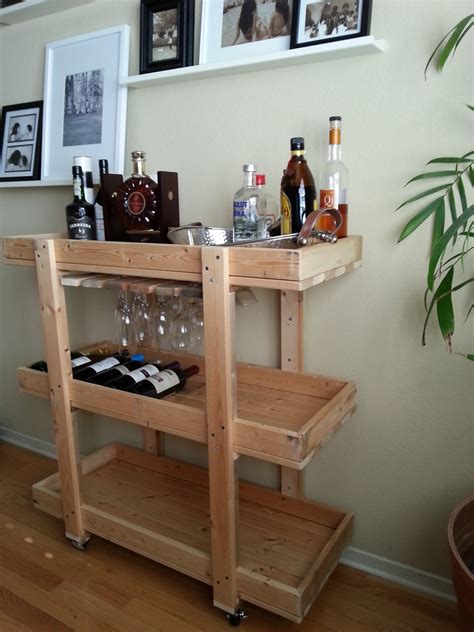 Unscrew the cabinet unit from the soffit and remove the cabinets. the nifty nest: DIY Bar Cart
