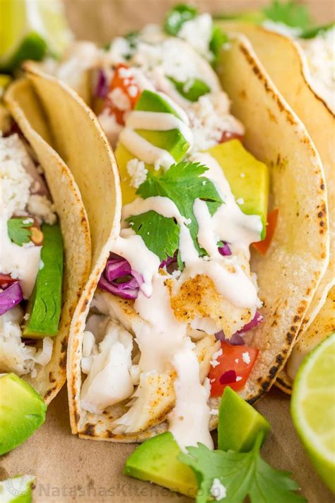 The best fish tacos with spicy crispy battered fish, diced avocado, crunchy slaw and the best fish taco sauce. Fish Tacos Recipe with Best Fish Taco Sauce ...