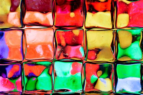 Abstract Textured Background Of A Multicolored Glass Block Wall Stock