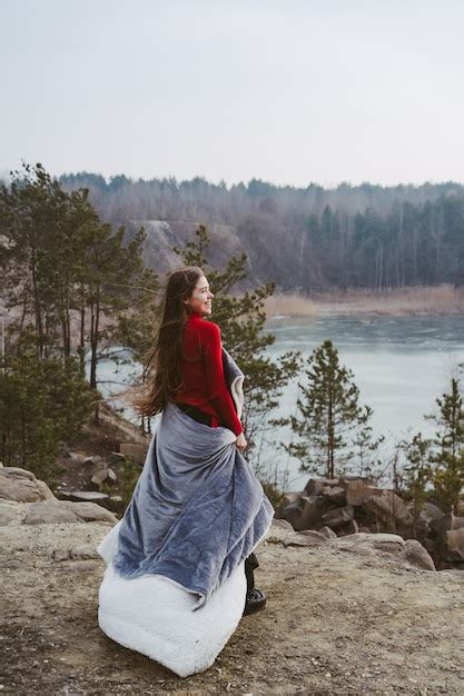 Young Beautiful Woman Posing On A Lake Free Photo