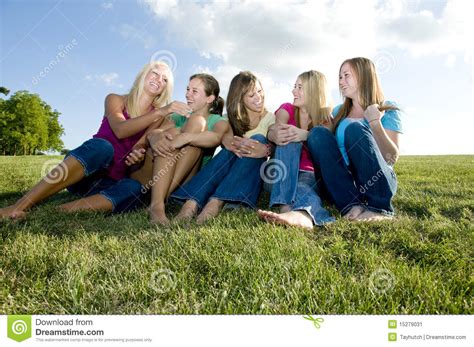 5 Girls Sitting Together And Laughing Stock Image Image 15279031