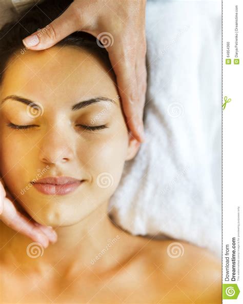 Close Up Portrait Of A Young Woman Getting Spa Treatment Stock Photo