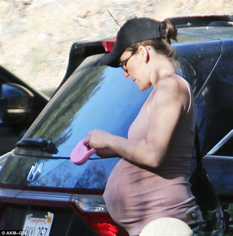 Heavily Pregnant Milla Jovovich Displays Her Beautiful