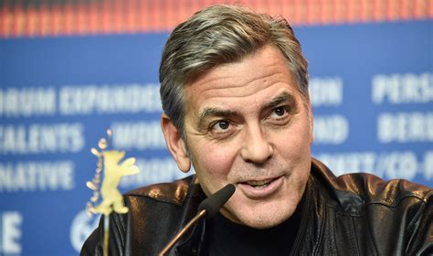 Berlin George Clooney Snaps At Reporter Over Refugee