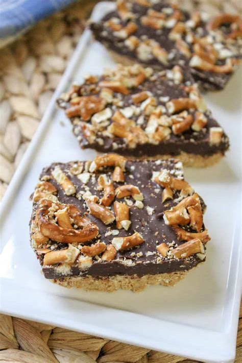 Overhangs the edges of the foil to lift the bars easier from the baking dish. No Bake Chocolate Peanut Butter Pretzel Bars - Inspired ...