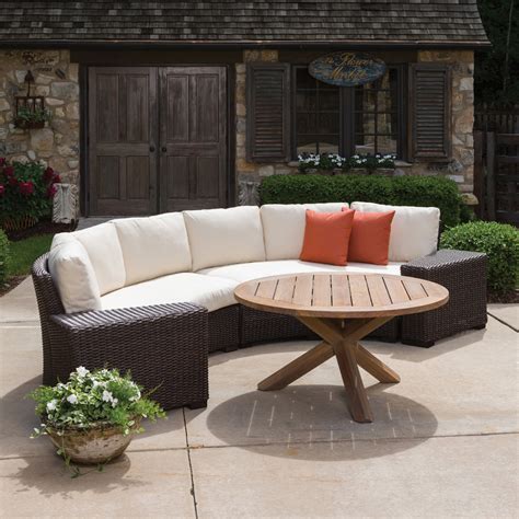 For more outdoor decorating ideas, check out our patio designs. Lloyd Flanders Mesa Curved Wicker Sofa Sectional | 298056
