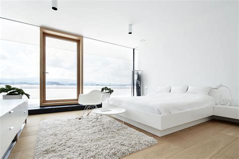 Adding wide horizontal stripes help to make a small. pure white bedroom | Interior Design Ideas