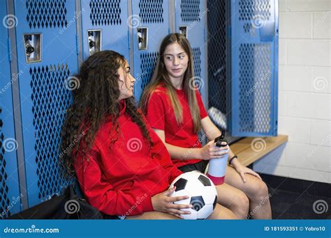 Two Soccer Teammates In A Locker Room Smiling Together After Soccer Practice Stock Image Image