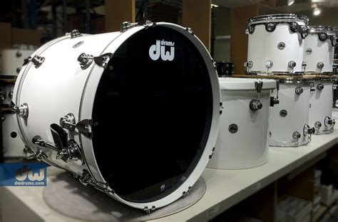 A White Drum Set Sitting On Top Of A Counter