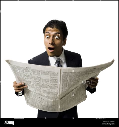 Businessman Reading Newspaper Stock Photo Alamy