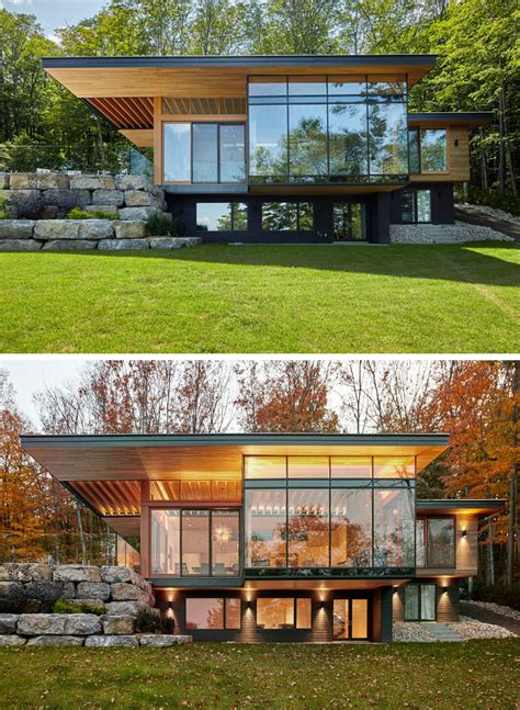 A Contemporary Cottage With A Cantilevered Roof Overlooks A Lake In Canada