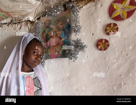 Eritrean Kunama Tribe Teenage Girl In Front Of A Religious Poster Gash