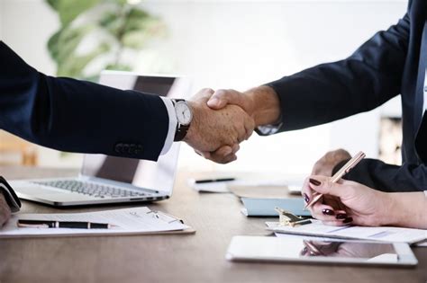 Free Stock Photo Of Firm Handshake Between Two Business People