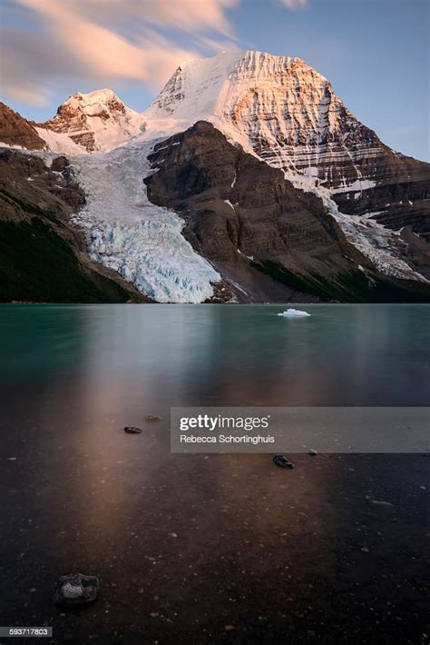 Mt Robson At Sunset With Ice Berg In Berg Lake High Res Stock Photo