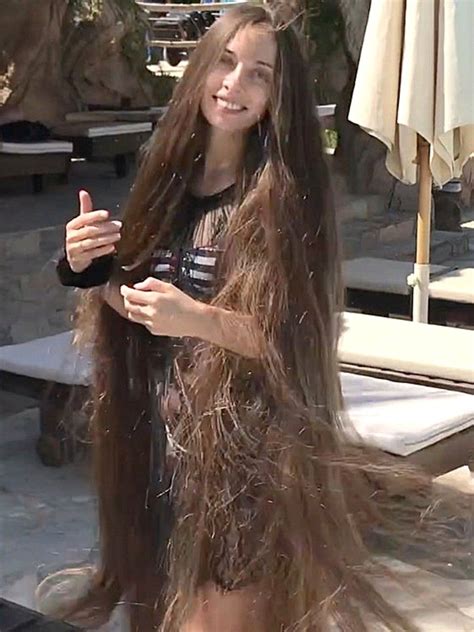 video rapunzel vacation in 2020 long hair styles very long hair thick hair styles