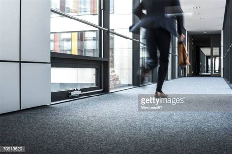 Man Running Office Photos And Premium High Res Pictures Getty Images