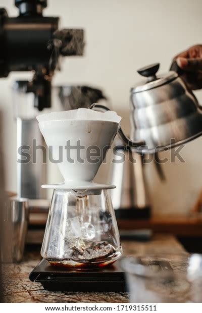 Barista Preparing Japanese Pour Over Coffee Stock Photo 1719315511