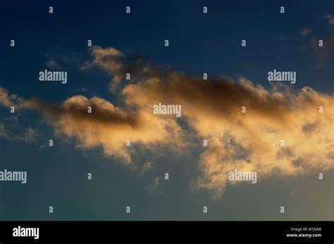 Evening Sky And Warm Coloured Clouds Stock Photo Alamy