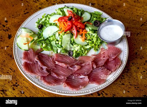 Yellowfin Tuna Sashimi Fresh Raw Fish Served With A Green Salad Stock