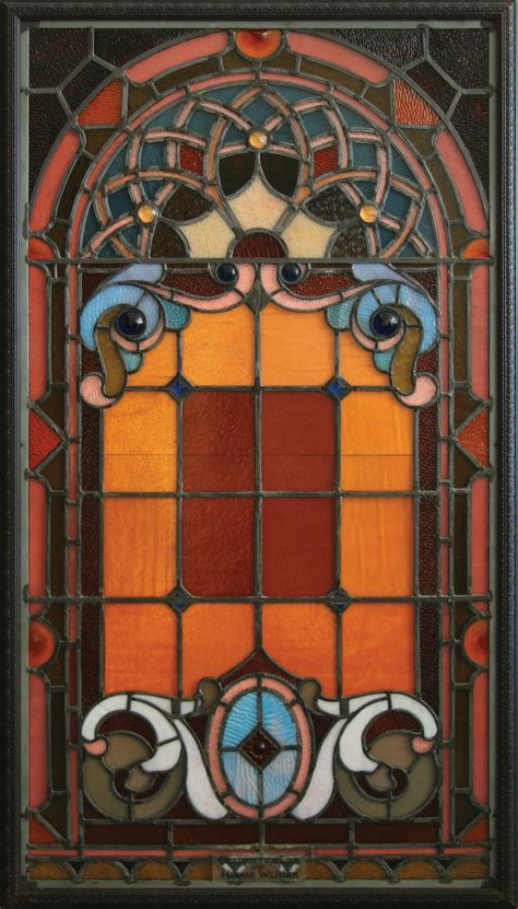A framed stained-glass shadowbox before the light panels were installed