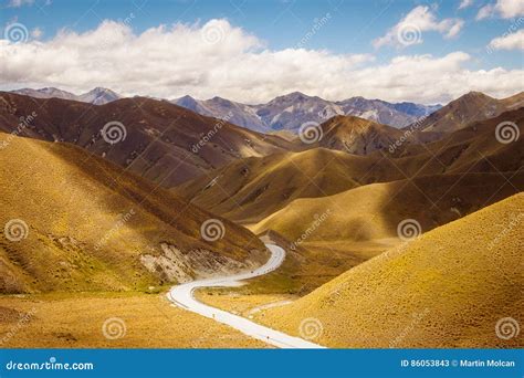 Scenic View Of Mountains And Road At Lindis Pass Nz Stock Image