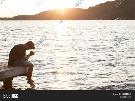 Young Man Sitting On Image And Photo Free Trial Bigstock