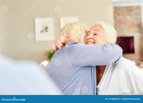 Two Senior Women Hug Each Other Happily Stock Image Image Of