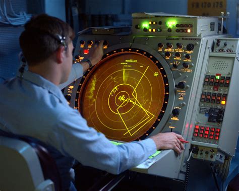 A Crewman Uses An Air Traffic Control Radar Atcr Screen Aboard The