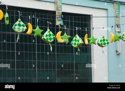 Decorations Hanging In Mid Air To Celebrate Hari Raya Festival Or Eid