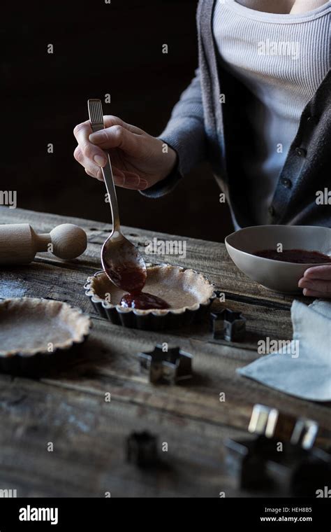 Woman Making Tarts Stock Photo Alamy