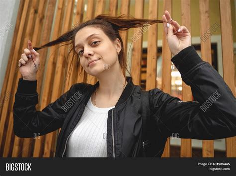 Young Woman Stands Image And Photo Free Trial Bigstock