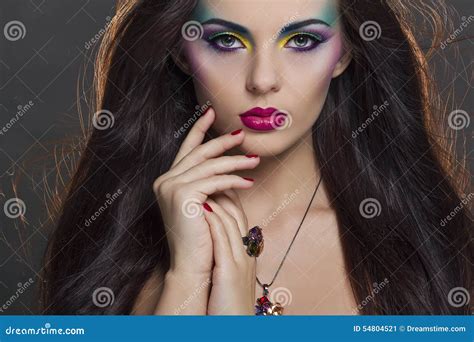Beautiful Woman Portrait With Bright Colourful Makeup Stock Image