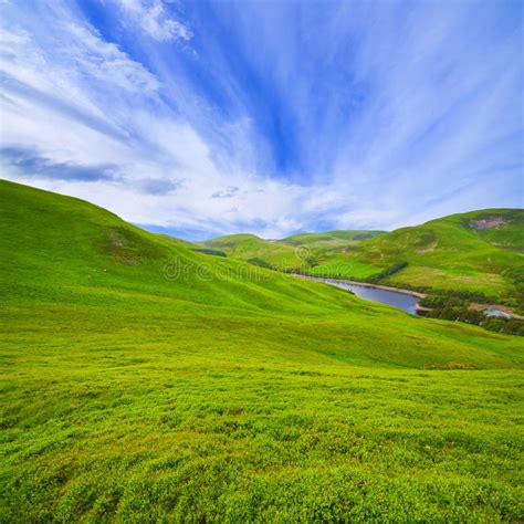 Landscape Scenery Of Green Valley Hill River And Cloudy Blue S Stock