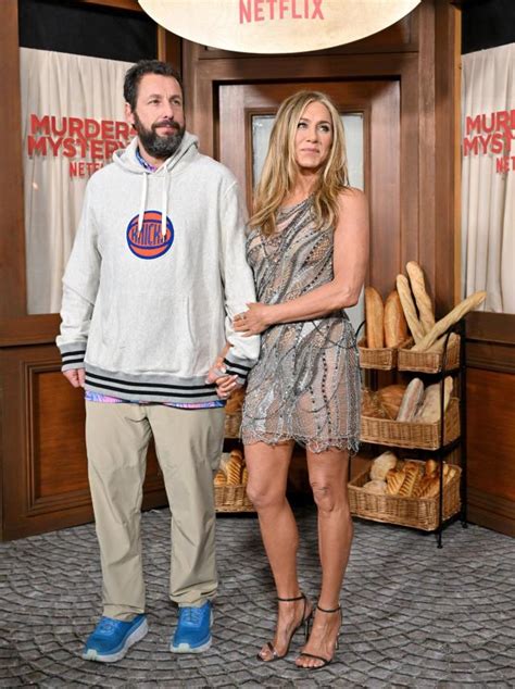 jennifer aniston called out adam sandler for wearing a sweatshirt to their premiere