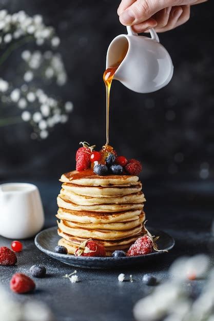 Premium Photo Pancakes With Berries And Maple Syrup Sweet Homemade