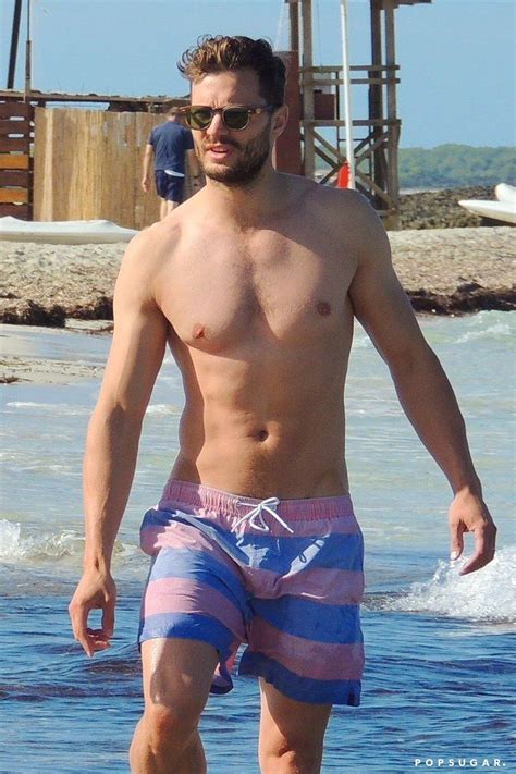 Shirtless Jamie Dornan Crawling On The Sand Is Sort Of Everything