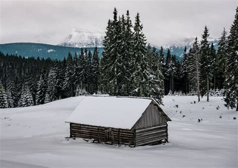 Wooden Snow Covered Cabin In Winter Mountains Stock Image Image Of