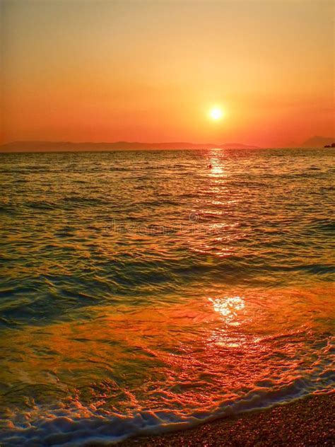 Beautiful Sunset On The Beach Sun Sky Sea Waves Stock Photo Image